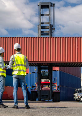 Two Colleagues at a Docking Station