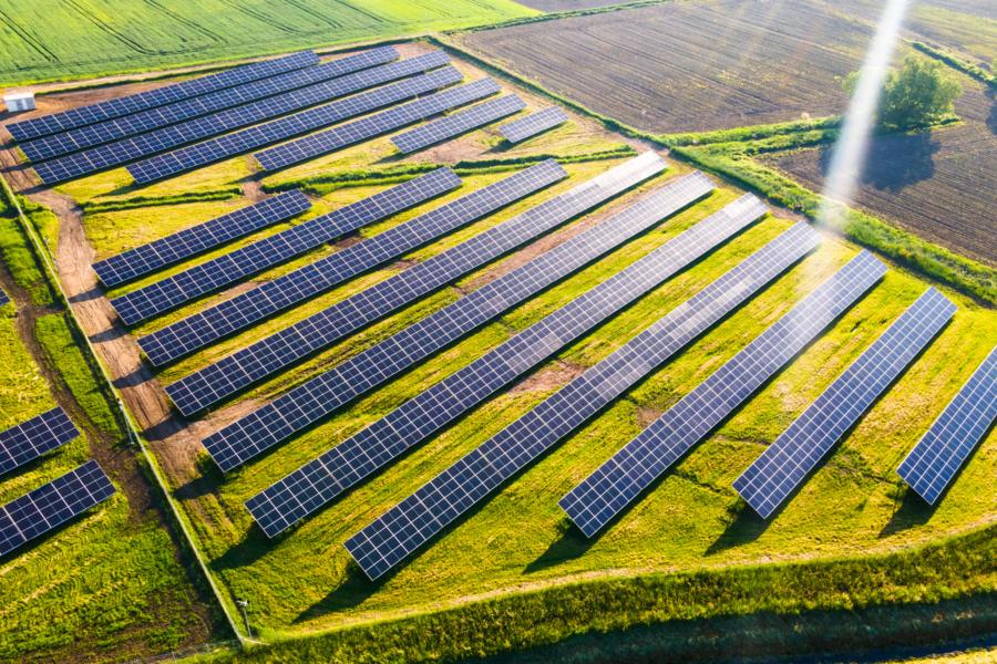 Solar panels on a green field 