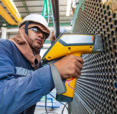Man working on industrial assets