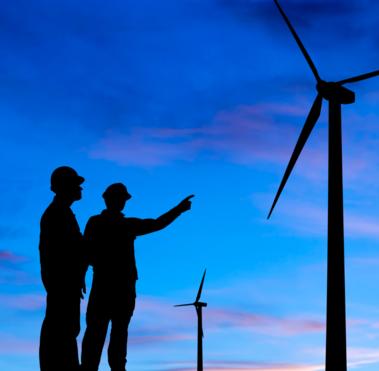 Colleagues working on a wind farm 
